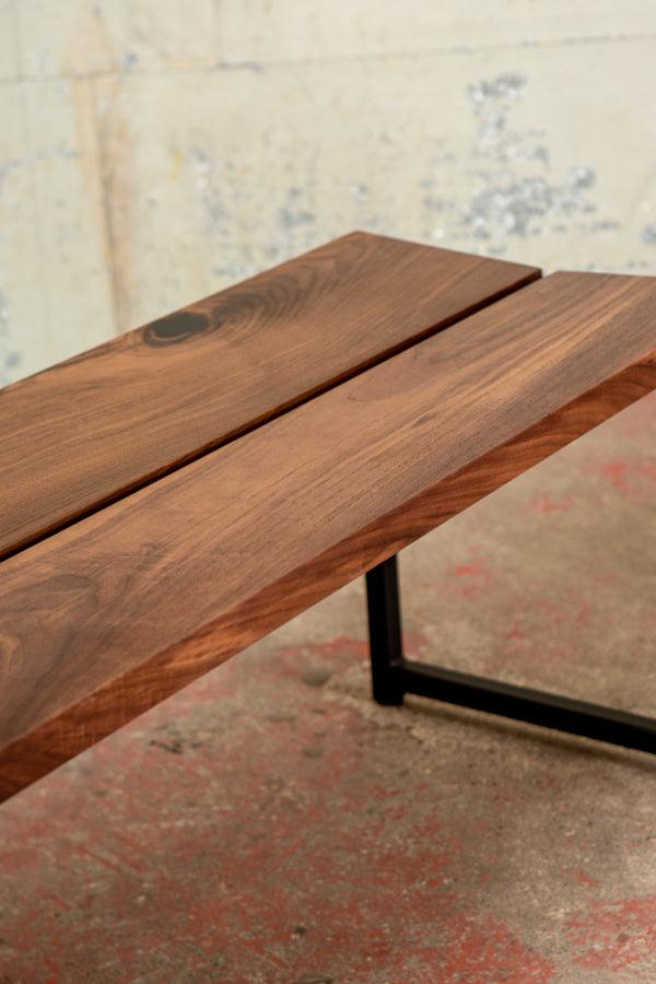 angled wooden seat of bench